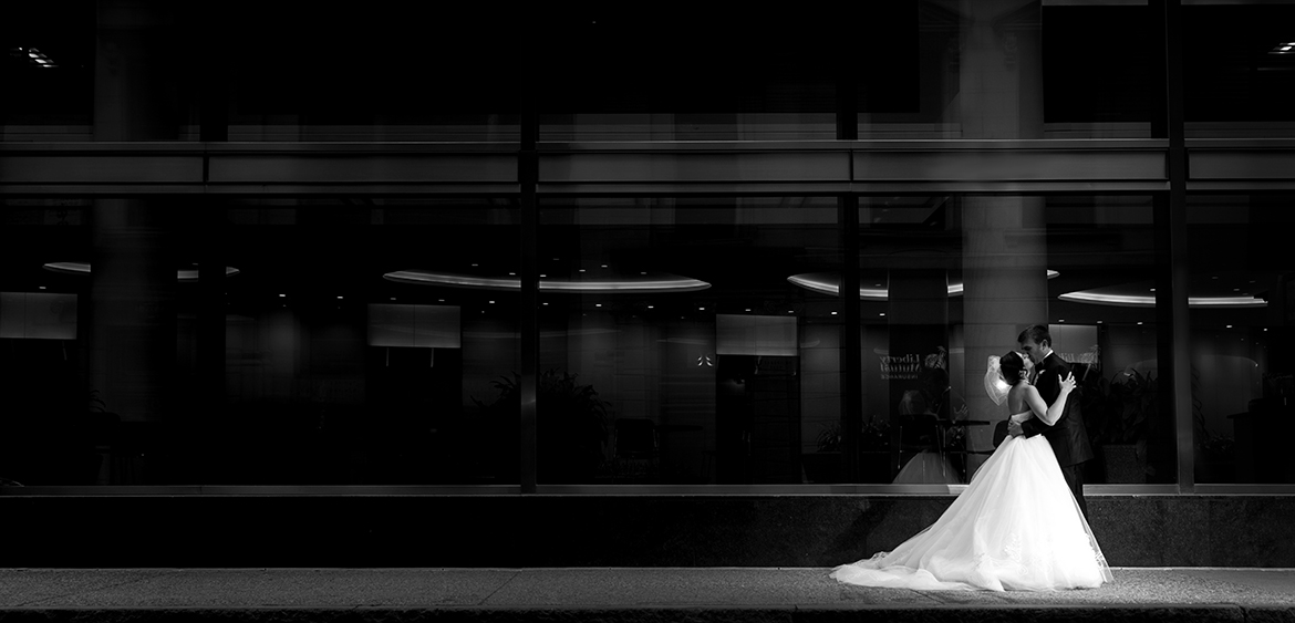 bride & groom kissing in Boston